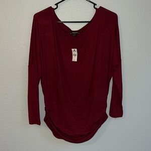 Express long sleeve banded top tags still on! Small